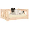 A pug dog lying on a wooden dog bed. Náhled obrázku produktu