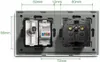 The back of a white electrical outlet with multiple connection points, including a coaxial connector, a network port, and a standard electrical socket. Dimensions are indicated with lines and measurements. Produktbild-Vorschau