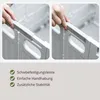Close-up shots of hands interacting with a gray folding storage box, with descriptive text below. Produktbild-Vorschau