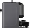 Side view of a robot vacuum cleaner docking station with a robot vacuum cleaner partially inserted. Náhled obrázku produktu