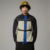 A person wearing a jacket and hat against a plain background. Produktbild-Vorschau