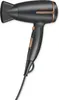 A studio shot of a black and gold hair dryer against a white background. Podgląd zdjęcia produktu