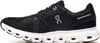 A side view of a black and white running shoe. Anteprima dell’immagine prodotto