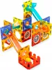 A colorful magnetic building set with slides and balls, arranged in a playful structure. Produktbild-Vorschau