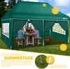 A family is enjoying a meal under a green gazebo in a garden. Produktbild-Vorschau