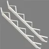 Two white metal stair stringers are shown against a plain gray background. Produktbild-Vorschau