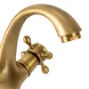 A close-up shot of a vintage-style faucet with an antique brass finish. Náhled obrázku produktu