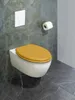 A wall-mounted toilet with a yellow seat is shown in a modern bathroom with dark marble-effect tiles. Anteprima dell’immagine prodotto