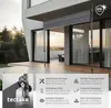 A modern house with a gray awning extended over a wooden deck. Produktbild-Vorschau