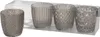Four glass candle holders in a clear plastic package. Voir les images du produit