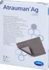 A product box for Atrauman Ag Silver dressing, showing a sample of the dressing. Produktbild-Vorschau