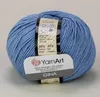 A ball of blue yarn with a label. Anteprima dell’immagine prodotto