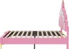 Side view of a pink bed frame with a crown-shaped headboard. Podgląd zdjęcia produktu