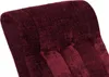 A close-up view of the textured burgundy fabric of a chair's headrest. Anteprima dell’immagine prodotto
