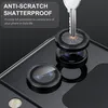 A close-up shot of a phone's camera lenses with a key attempting to scratch one of them, demonstrating its scratch-resistant properties. Produktbild-Vorschau
