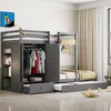 A children's bedroom with a gray bunk bed, wardrobe, and pull-out bed.
