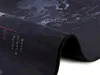 A close-up view of a rolled-up world map, showing the South Atlantic Ocean. Náhled obrázku produktu