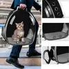 A person is walking up stairs while carrying a cat in a transparent backpack. Voir les images du produit