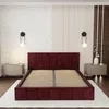 A bedroom scene with a bed, nightstands, and wall decor. Produktbild-Vorschau