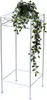 A white metal plant stand with a trailing green plant on top. Anteprima dell’immagine prodotto