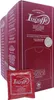 A close-up shot of a large red box of Lucaffe coffee pods, with a single red pod packet in the foreground. Náhled obrázku produktu