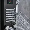 A close-up view of a black LED shower panel system with water spraying from the showerhead and body jets. Náhľad obrázku produktu