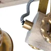 A close-up view of a light fixture's wooden and brass components, with a black and white patterned cord. Produktbild-Vorschau