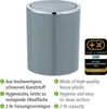 A grey trash can with a silver lid and trim, shown with marketing text and an award badge. Produktbild-Vorschau