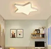 A star-shaped ceiling light fixture in a child's room. Náhled obrázku produktu