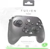 The image shows the packaging of a black Xbox controller. Podgląd zdjęcia produktu