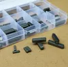 A clear plastic organizer box filled with parallel keys, with some keys scattered in front of the box. Produktbild-Vorschau