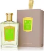 A perfume bottle and its box are displayed against a white background. Voir les images du produit