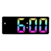 A digital alarm clock displaying the time 6:00 with a rainbow-colored LED display. Náhled obrázku produktu