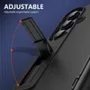 Close-up of a black phone case with a kickstand extended, showing the camera lenses. Produktbild-Vorschau