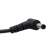 A close-up shot of a black power adapter cable with a silver connector tip. Produktbild-Vorschau