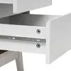 A close-up view of an open drawer on a white piece of furniture, showing the drawer slides and screws. Produktbild-Vorschau