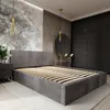 A modern bedroom with a bed frame, nightstand, and wardrobe. Produktbild-Vorschau