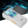 A digital force gauge is shown in front of a blurred background of a circuit board and a microchip. Náhľad obrázku produktu