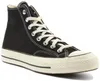 A studio shot of a black Converse Chuck 70 high-top sneaker. Voir les images du produit