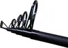 A close-up view of the tip section of a black fishing rod, showing the guides. Anteprima dell’immagine prodotto