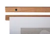 A close-up view of a wooden poster hanger system holding a piece of art. Náhľad obrázku produktu
