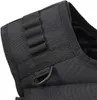 Close-up of the shoulder strap of a black tactical vest, showing stitching and a D-ring. Produktbild-Vorschau