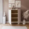 A modern living room scene featuring a white and wood cabinet, artwork, and decorative items. Produktbild-Vorschau