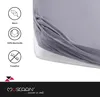 A close-up of a grey fitted sheet draped over a white mattress, with icons and text on the left side detailing product features. Produktbild-Vorschau