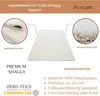 A cream-colored shaggy rug is shown with close-up views of its texture and details, along with descriptive text about its features and certifications. Anteprima dell’immagine prodotto