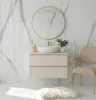 A bathroom vanity with a sink, faucet, mirror, and a chair. Náhled obrázku produktu