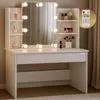 A white vanity table with a mirror and LED lights, featuring shelves with makeup and perfume bottles, and a remote control. Produktbild-Vorschau