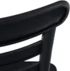 A close-up view of the backrest of a black chair. Produktbild-Vorschau