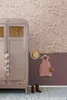A child's room with a wardrobe, wallpaper, and accessories. Náhled obrázku produktu