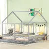 A children's bedroom with a grey house-shaped bed frame, two mattresses, and stuffed animals. Náhľad obrázku produktu